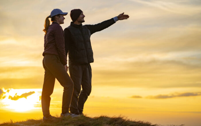 Man and woman looking to the horizon